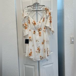 Off the shoulder floral mini sundress.